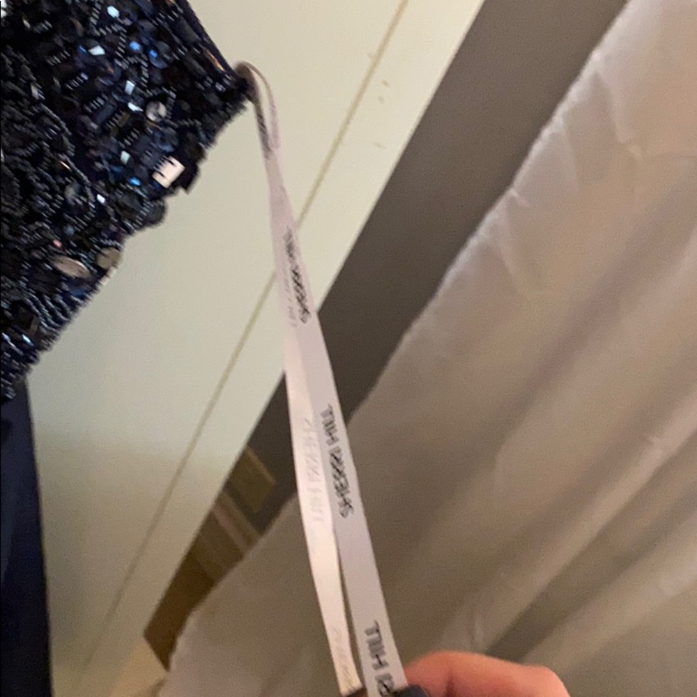 I Wore It Once But Now It Is Too Small. - image 2